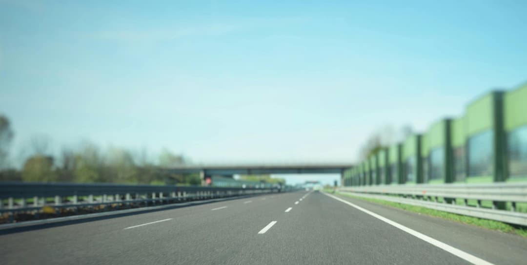 Photo by photoGraph: https://www.pexels.com/photo/gray-asphalt-road-under-blue-sky-1021683/