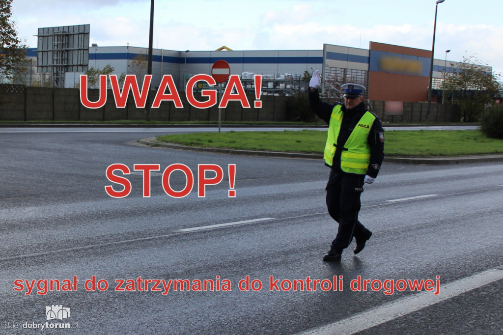 Policjant kieruje ruchem. Wiesz, co robić?