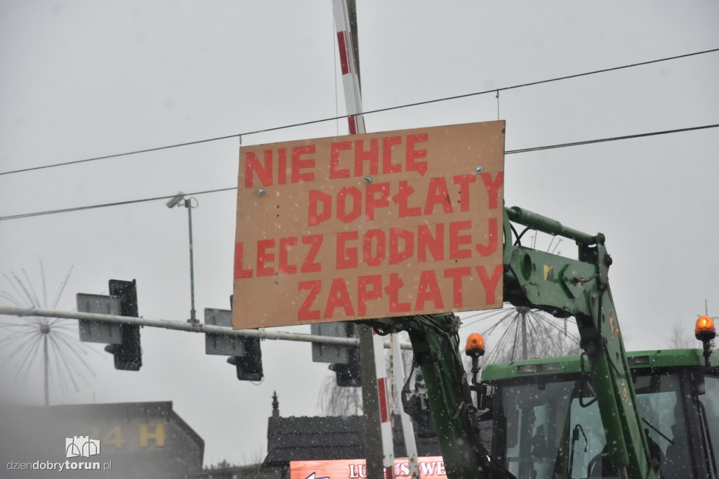 Transparenty rolników na proteście