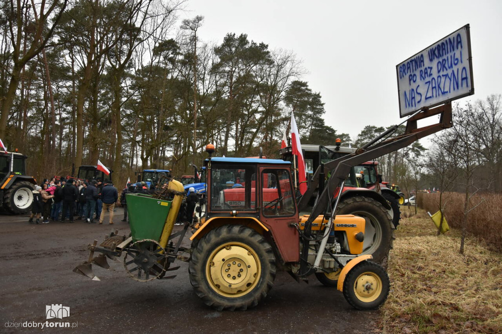 Transparenty rolników na proteście