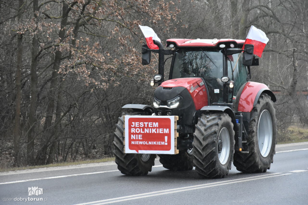 Transparenty rolników na proteście