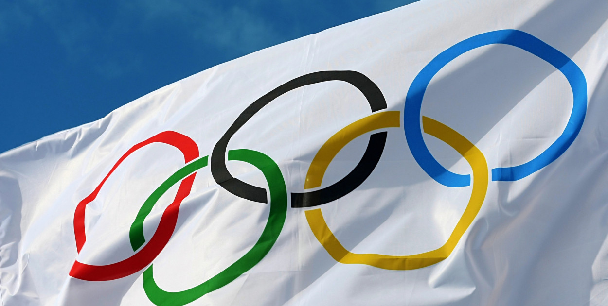 Flaga Igrzysk Olimpijskich. Zdjęcie ilustracyjne. Depositphotos
